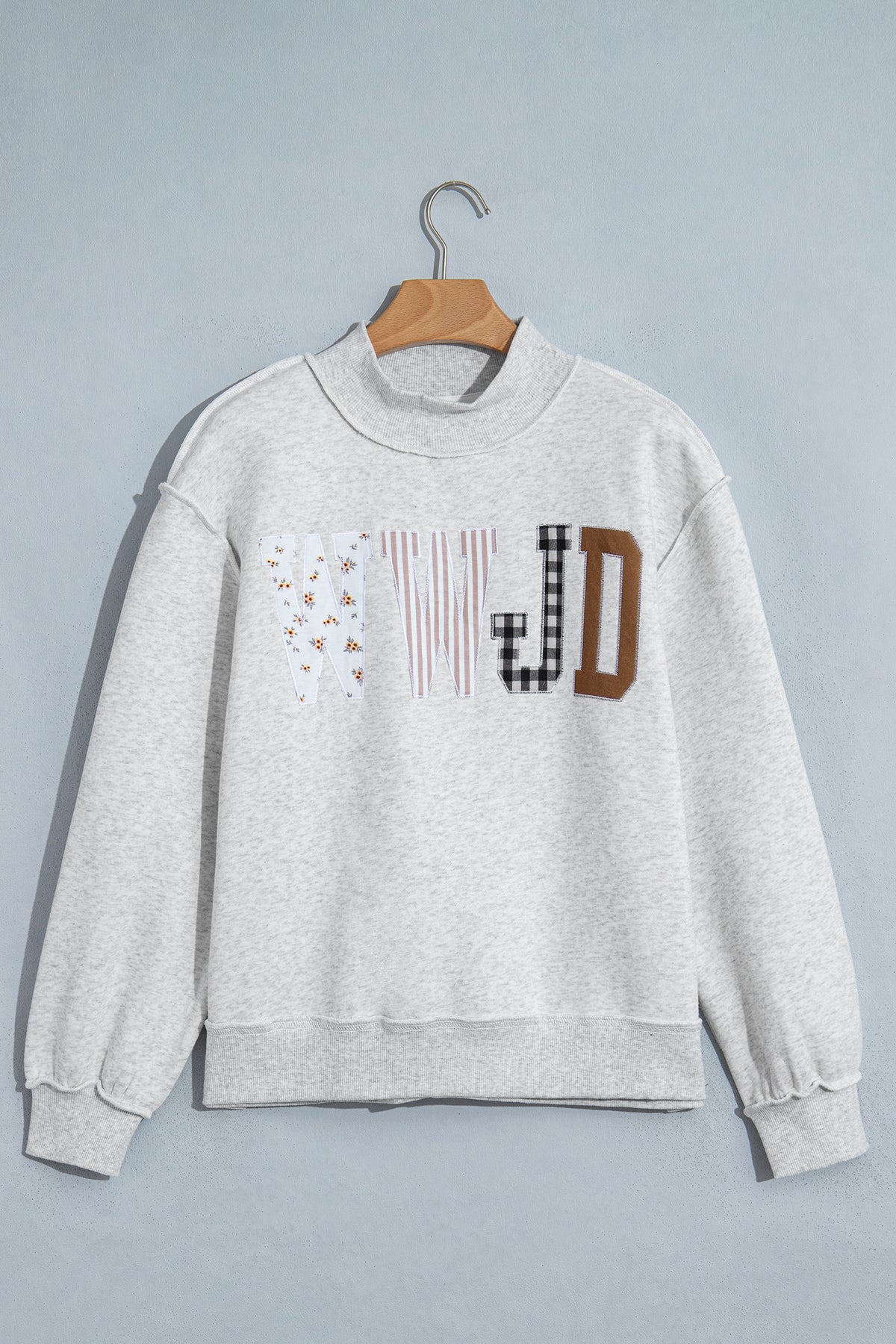 WWJD Mixed Pattern Embroidered Patch Graphic Mock Neck Sweatshirt