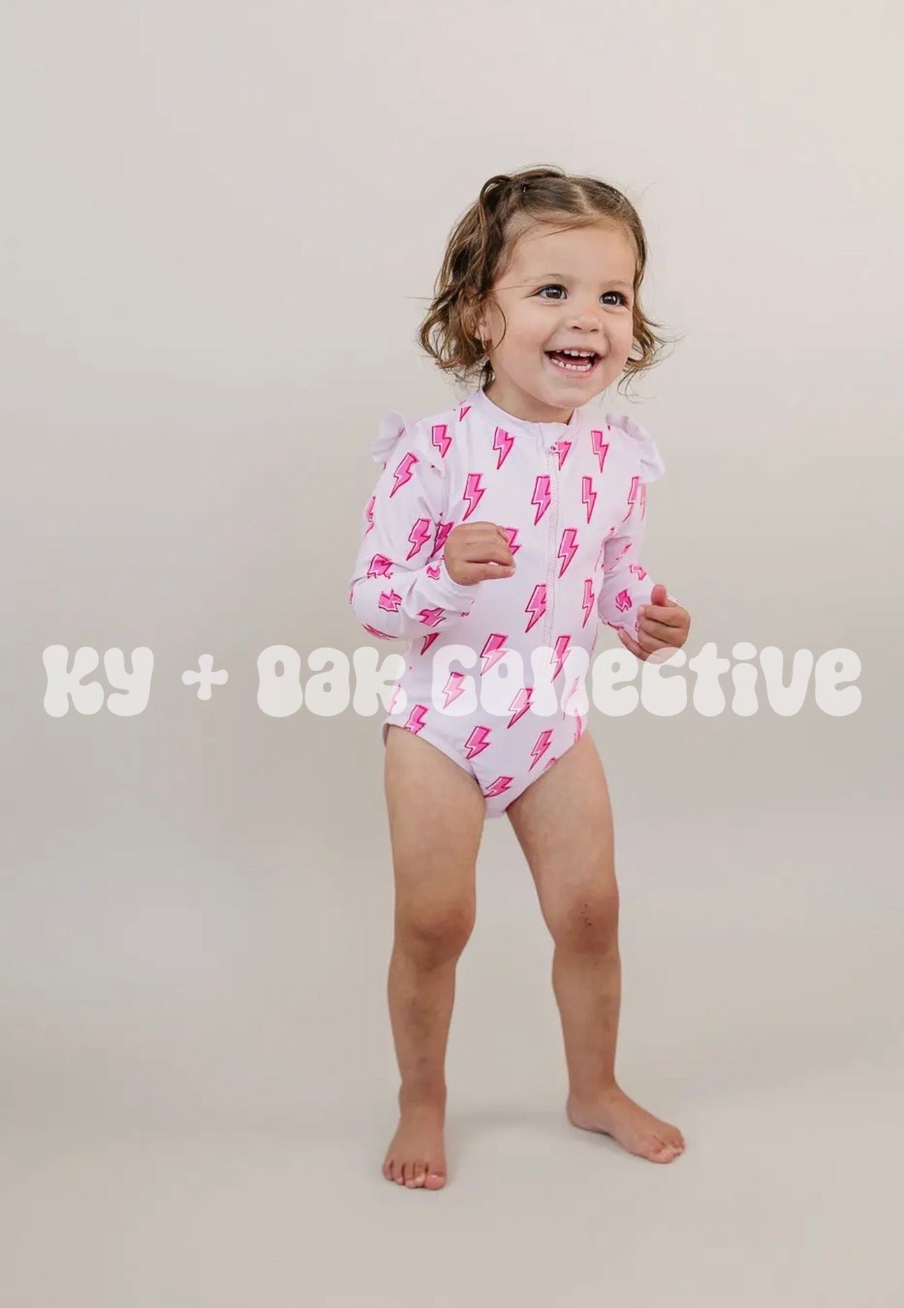 Long Sleeve Rash Guard Swimsuit | Pink Bolts