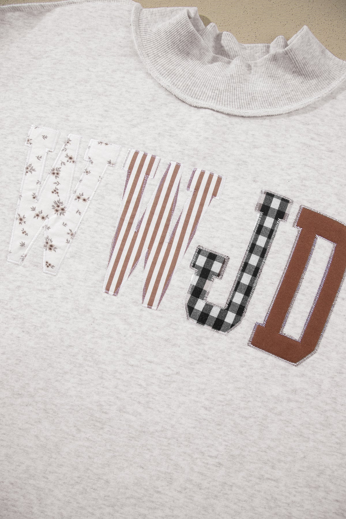 WWJD Mix Pattern Letter Graphic Exposed Seam Loose Plus Size Sweatshirt